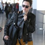Daisy-ridley-airport-leather-jacket