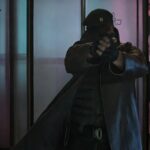 The Running Man 2025 Evan McCone Brown Leather Coat